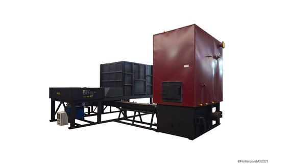 Котел с механическим бункером-ворошителем для опилок "Живое дно"